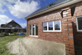 Terrasse - Neubau Doppelhaushälfte in ruhiger Sackgassenlage in Warsingsfehn